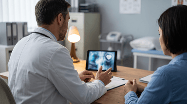 Healthcare professional discussing TRT with a patient